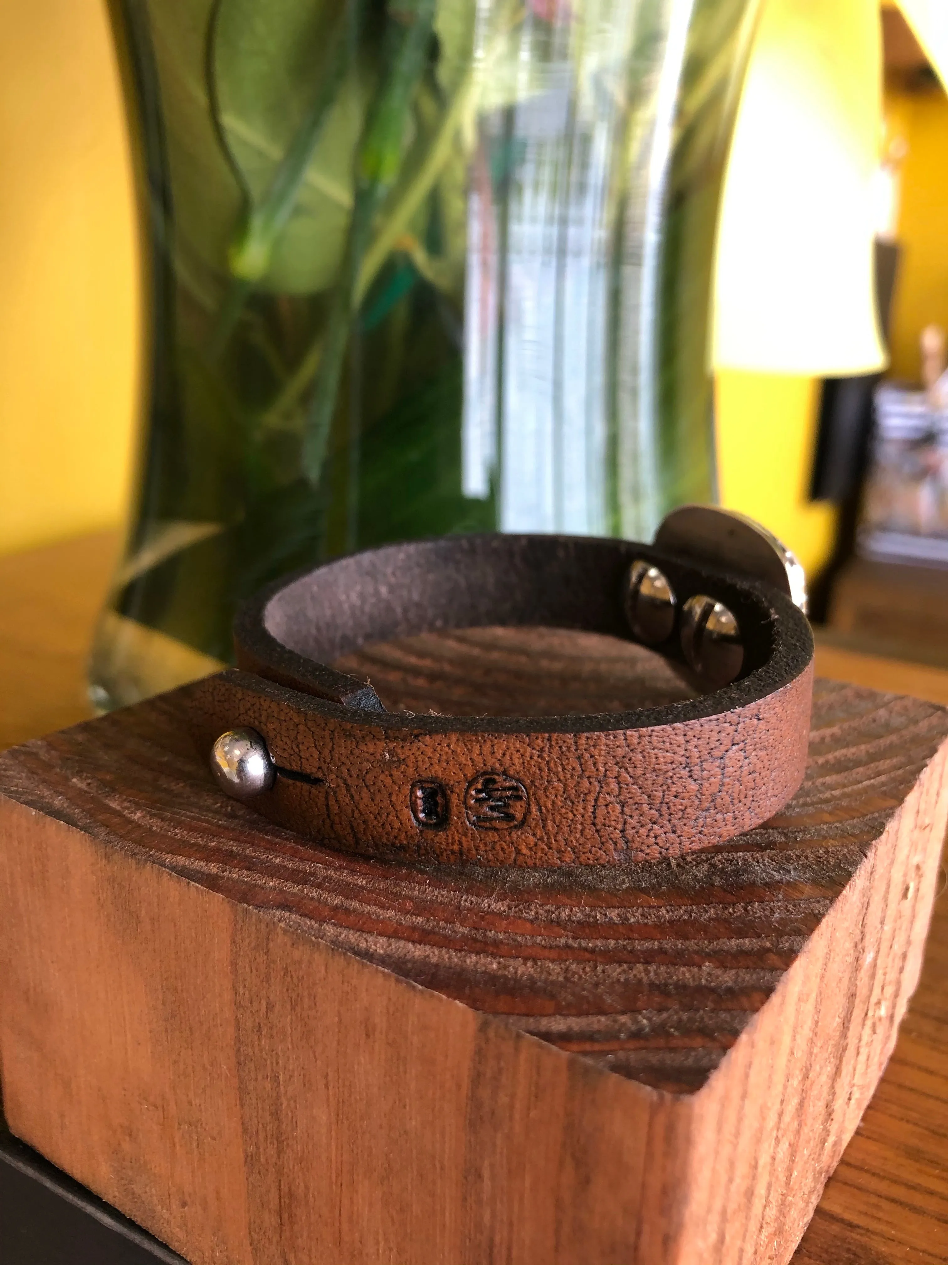 Turquoise with bead trim on brown leather