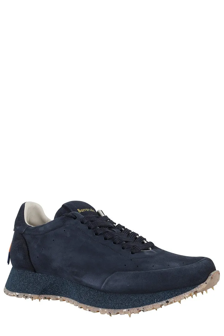 Vintage-Inspired Black Leather Sneakers With Textured Midsole